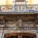 Lingresso  incorniciato da paraste in marmo decorate con bassorilievi floreali...